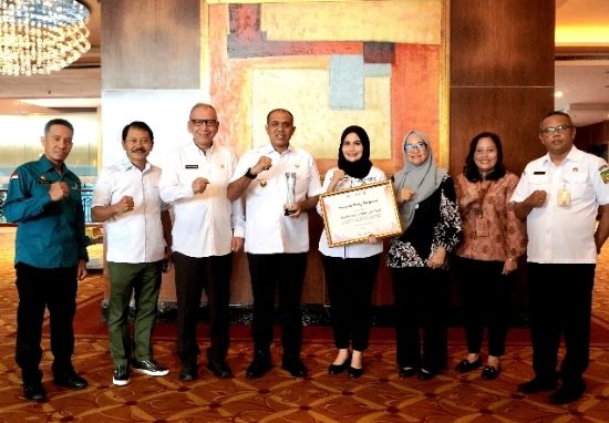 Langkat Raih Penghargaan Kabupaten Terbaik dalam Perluasan Akses Keuangan Tahun 2024