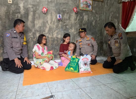 Kapolsek Selesai Ringkan Beban Bayi Penderita Hydrocepalus di Lau Mulgap